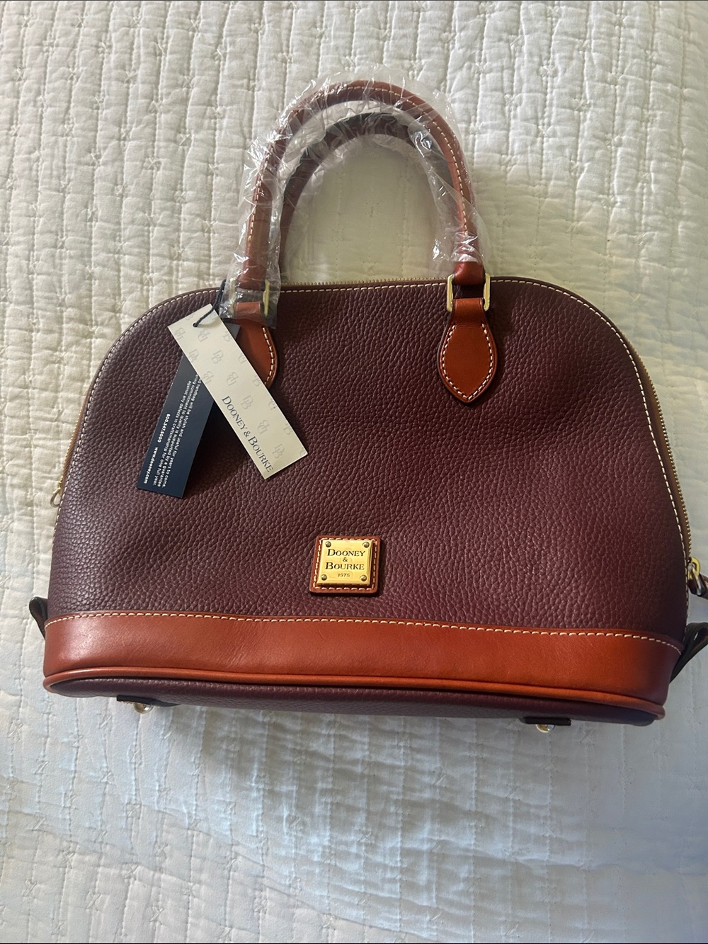 Dooney & Bourke Burgundy with Brown Trim Pebble Leather Satchel